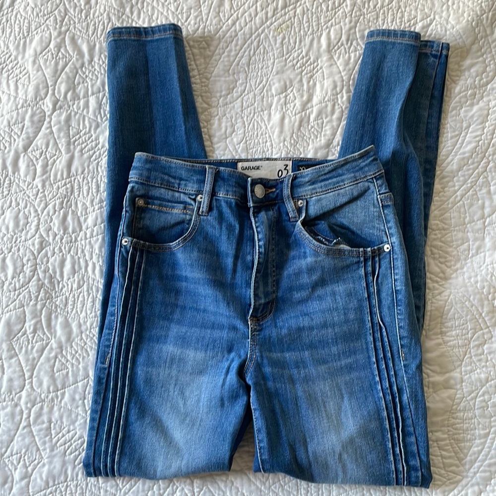 Dark blue garage skinny jeans with limes down side